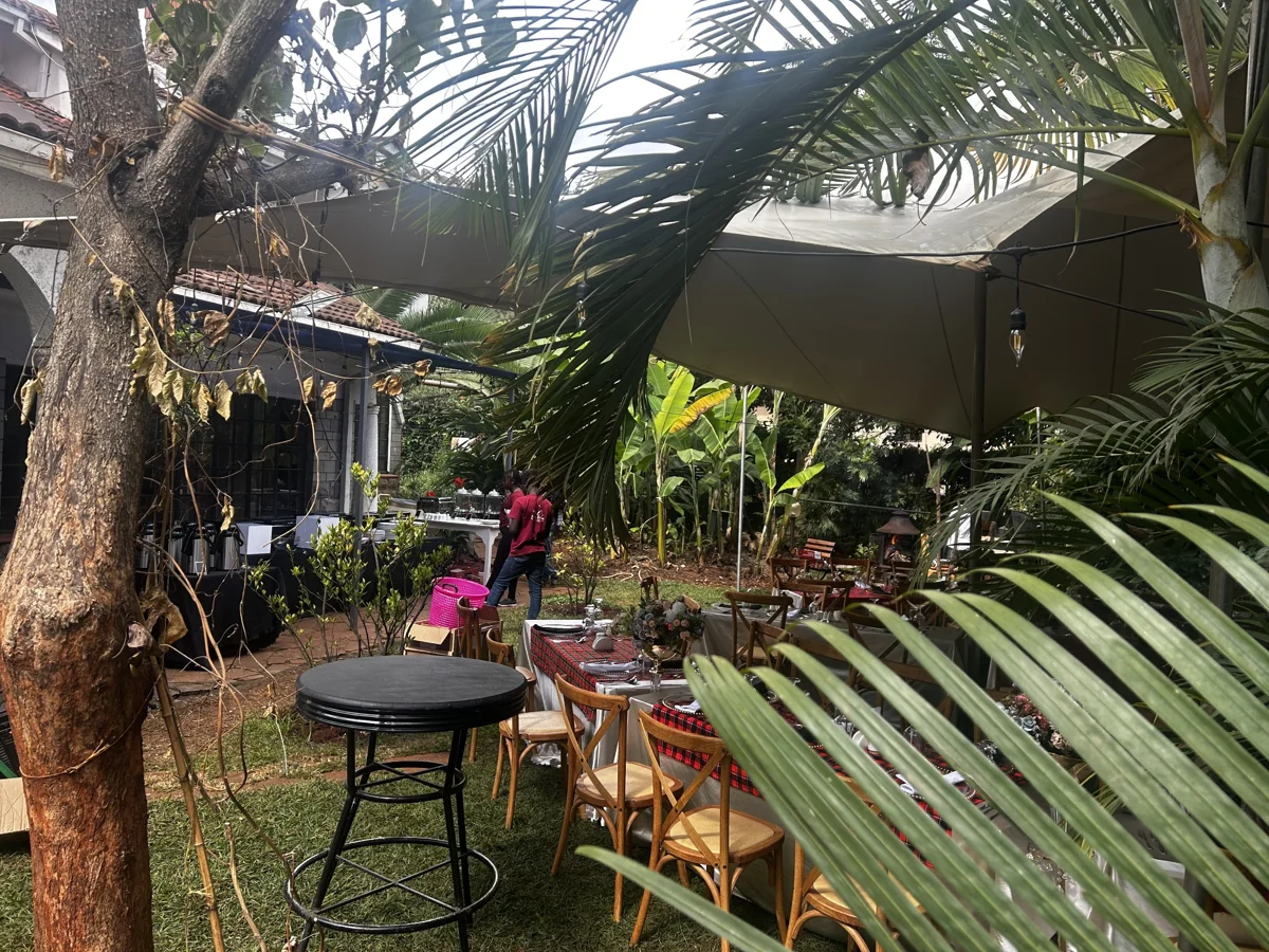 Garden gathering with wooden chairs and tables